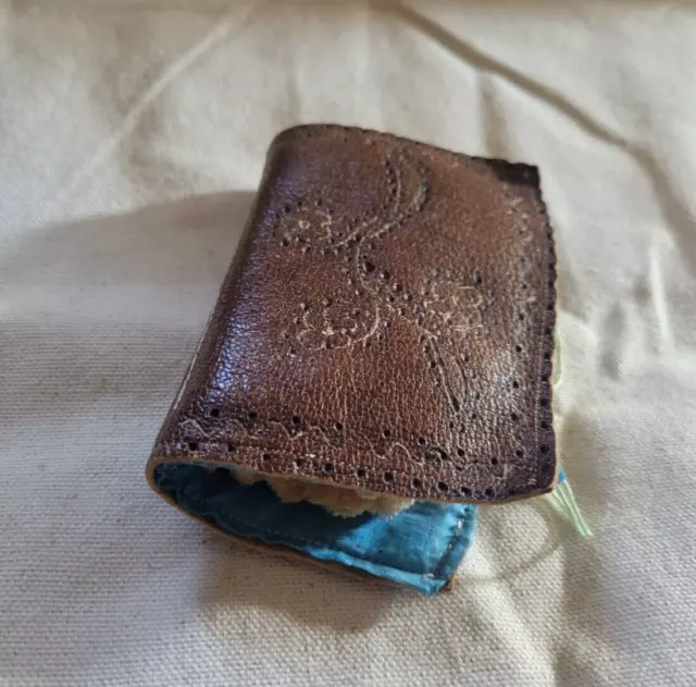 Vintage Handmade Needle wallet with Needles. Measuring roughly 3" x4" closed