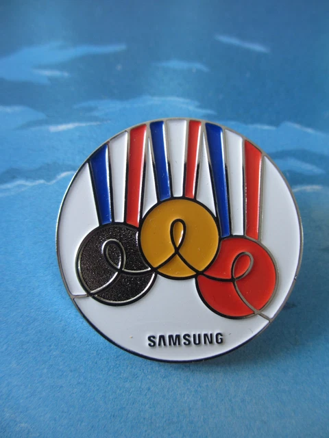 Pin's JO Paris 2024 - Léon Marchand, Médaille, Flamme - Métal - Occasion