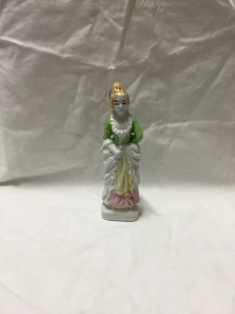 ceramic figurine. Victorian era style. Made in Japan. Circa 1930’s