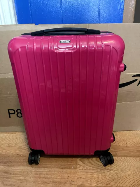 Rimowa pink luggage deals