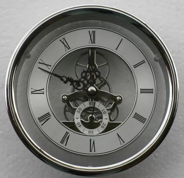 Skeleton Clock 149mm diameter quartz insertion, silver finish.