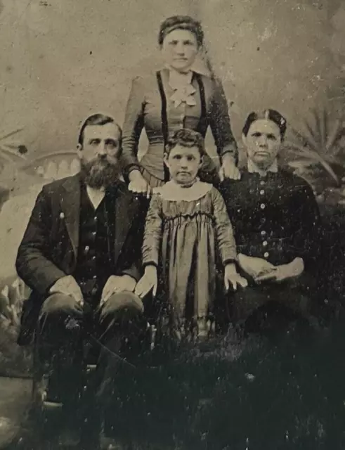 1800s Tintype Photograph of Victorian Era Family Posing For a Studio Portrait