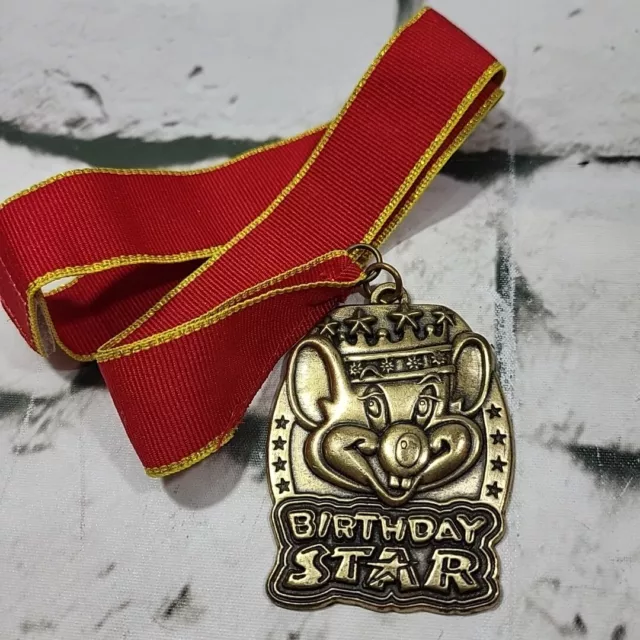 Vintage Chuck E Cheese Birthday Star Medallion Gold Metal Embossed w Red Lanyard