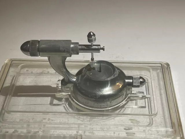 Unique Watchmakers Tool. Not a clue.
