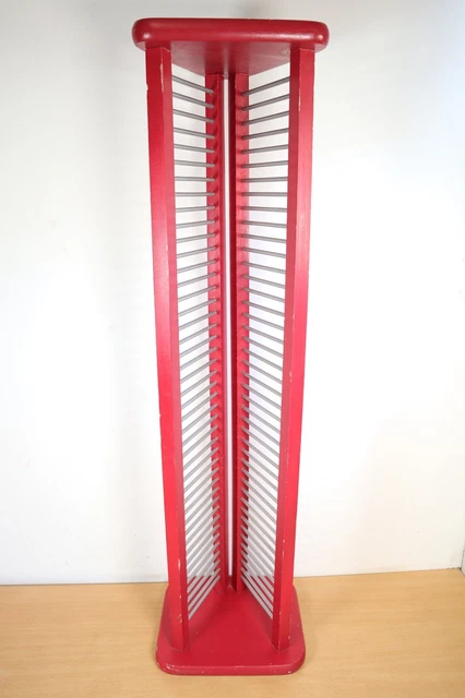 Almacenamiento de CD en estante de CD de madera contiene 42 CD  rojo alto en forma de triángulo independiente