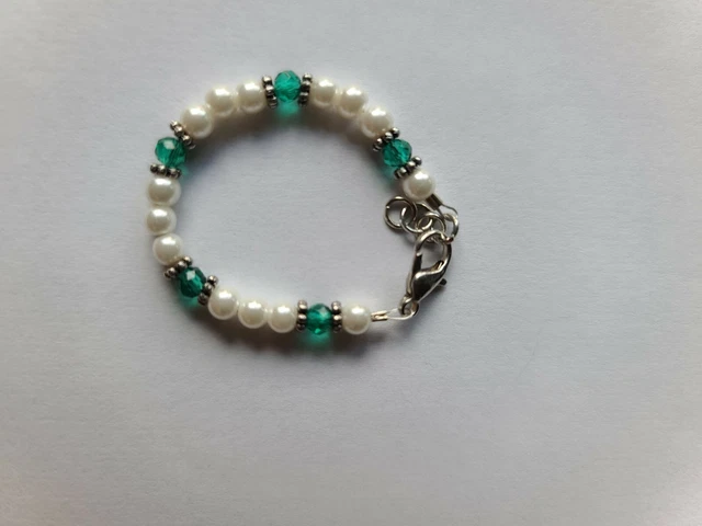 Newborn baby bracelet:  4mm glass pearl beads with green colored beads