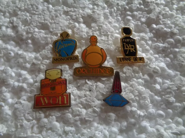 Job lot of 5 perfume bottle shaped metal lapel pins
