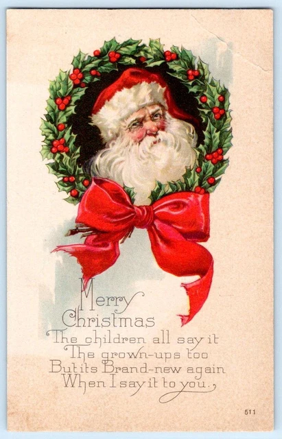 1910's SANTA CLAUS IN HOLLY WREATH BIG RED BOW ANTIQUE MERRY CHRISTMAS POSTCARD