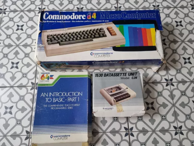 Commodore 64 personal computer + datasette + Introduction box + power cable