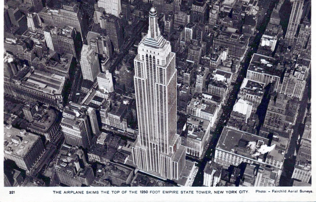 Airplane Skims The Top Of the Empire State Building NYC, NY 1930’s RPPC Postcard