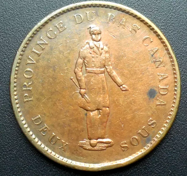 Lot of 2 bank tokens, Quebec bank, penny 1837 & bank of upper Canada half 1857