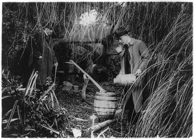 Dismantling a still in San Francisco,California,CA,Prohibition,1920-1930,men