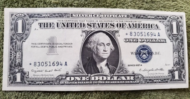 1957 Series A One dollar STAR NOTE BLUE SEAL Silver Certificate, uncirculated.