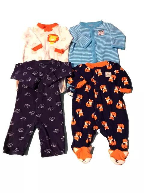 Lot of 4 NB Baby Boy, 3 Carter's and 1 Garanimals One Piece Footed Sleepers