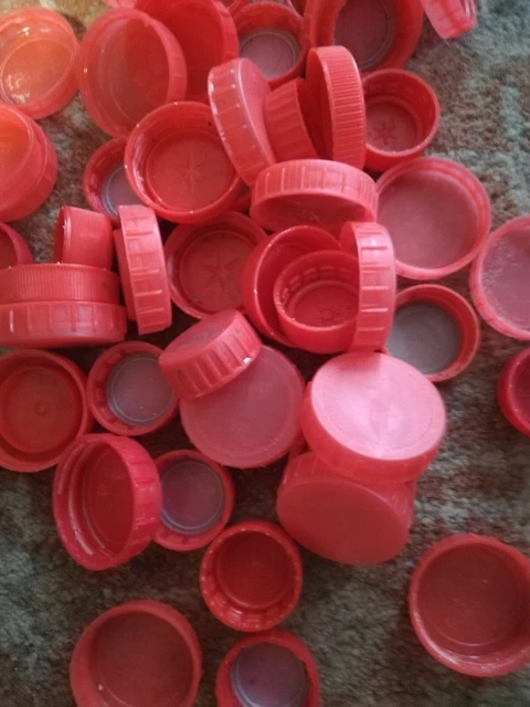 100 camisetas de plástico rojas