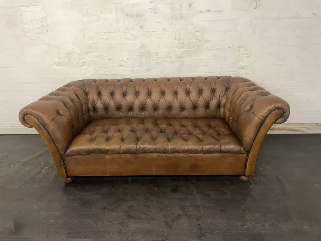 chesterfield Fully Buttoned Three seater sofa in antique Saddle Tan leather