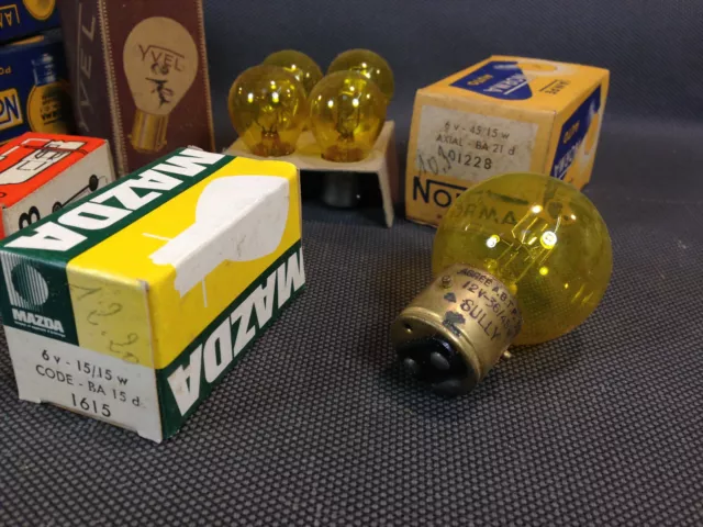 Lot anciennes ampoules automobile jaune 3 ergots NORMA SULLY stock ancien garage 2