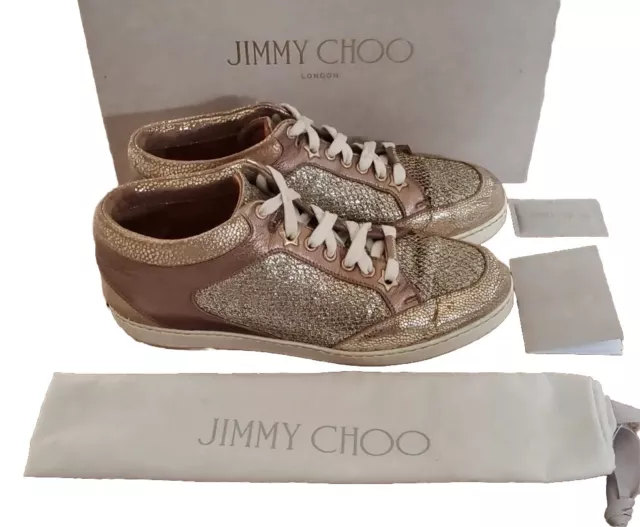 Champagne jimmy hotsell choo trainers