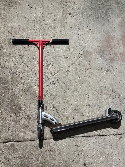 Custom built scooter stunt MGP wheels district bars odi grips