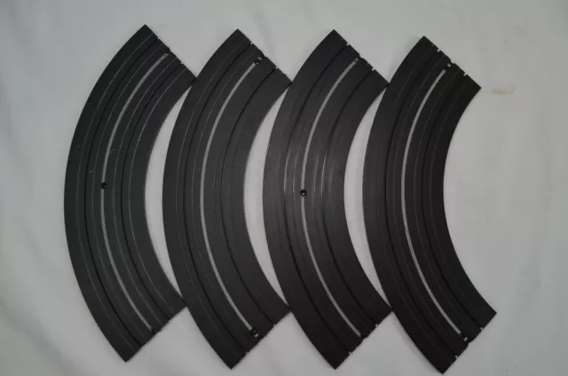 Aurora slot car track, 4 pieces, 9 inch radius, 1/4 section