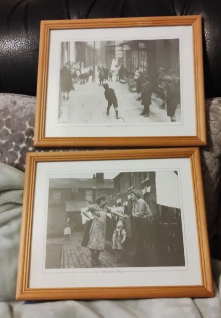 Pair of framed prints of street scenes in mid 20th century history