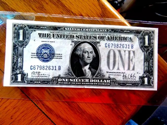 $1 1928 B CRISP UNCIRCULATED ( FUNNYBACK) Silver Certificate  Nice Note