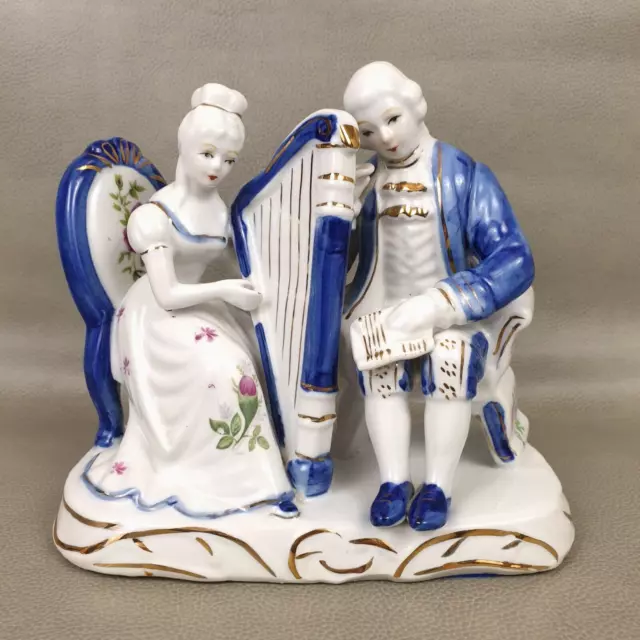 Vintage Blue & White Ceramic Glazed Figurine Couple Seated Playing Music