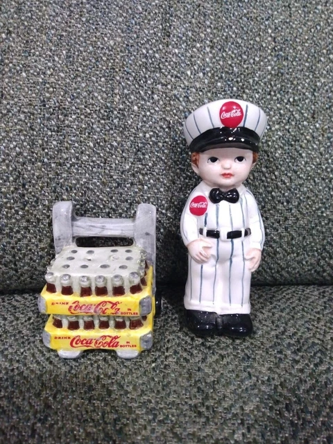 1996 ENESCO COCA COLA DELIVERY MAN SALT and PEPPER Boy W/ Cases Coke Bottles