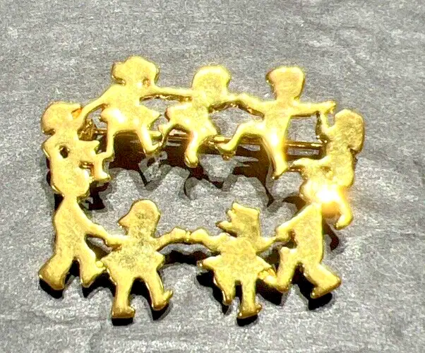 Gold Tone Children Holding Hands In A Circle Pin Brooch