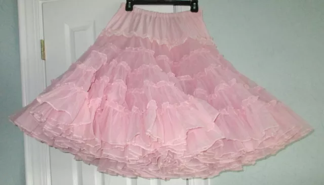 Multi-layered pink soft square dance petticoat waist 26 to 36in - length 25 in.