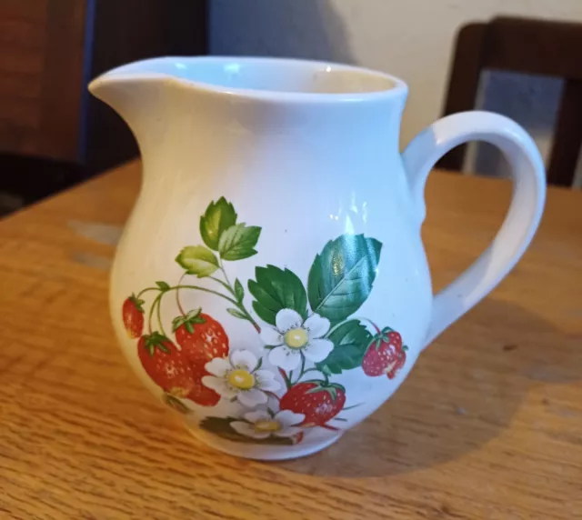 Holkham Pottery milk jug with strawberry design