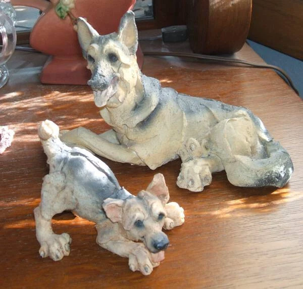 2 Adorable Clay Figurines Featuring "German Shepherds" To Add To Your Collection