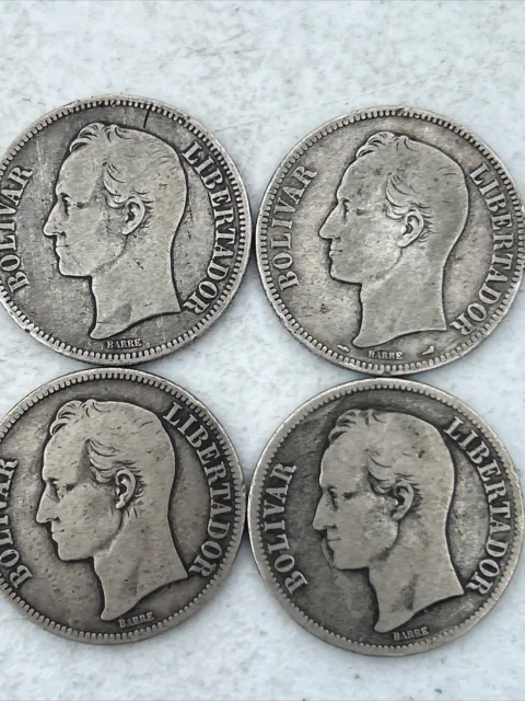 Four silver dollars Venezuela