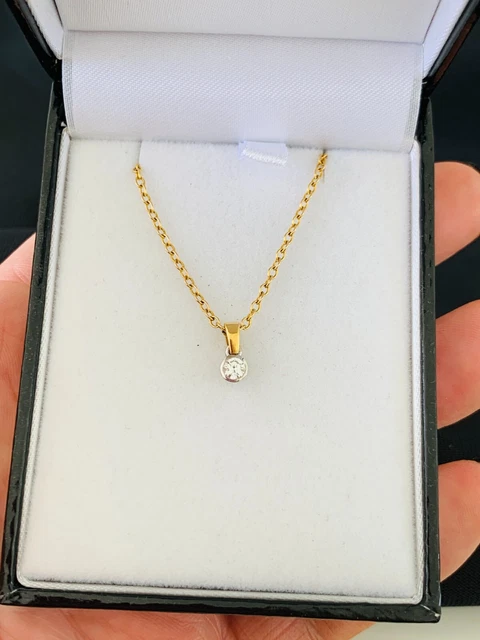 18ct gold diamond pendant on chain boxed 18ct gold diamond pendant on chain boxed