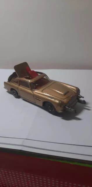 Corgi Toys James Bond Aston Martin Gold DB 5 70er Jahre Spielzeug aus Sammlung