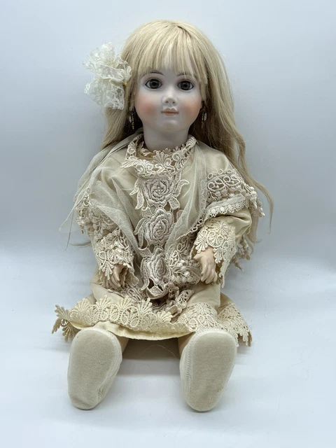 A Henri Rostal Mon Trésor bisque head musical pull-along doll, French circa  1914