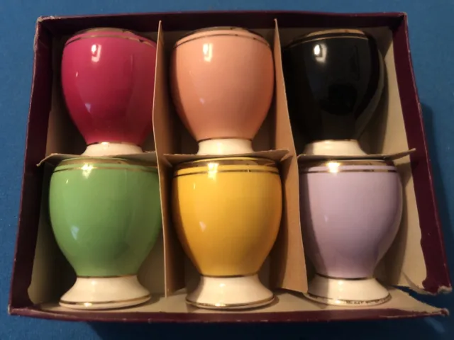 6 x Vintage  Romanian Ceramic egg cups in original box. Great unused condition.
