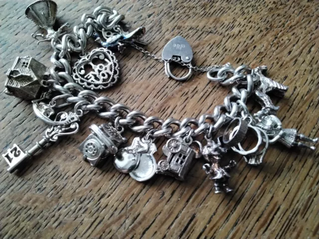 Solid Silver Charm Bracelet With 15 Charms