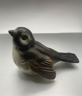 brown bird figurine