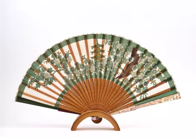 An Antique Mother Of Pearl Handled Hand Fan