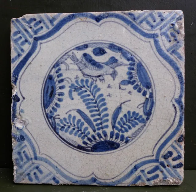 Rare Antique Delftware tile with a China Wang Li decor with bird. early 17th. C.
