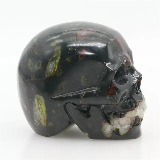 white green clouds black jade , carved skull,realistic,crystal healing K461