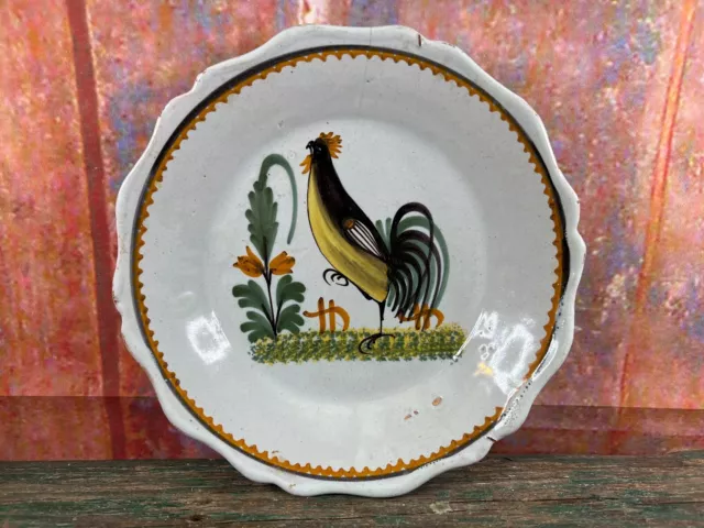 Assiette en faience de Nevers coq noir 19eme