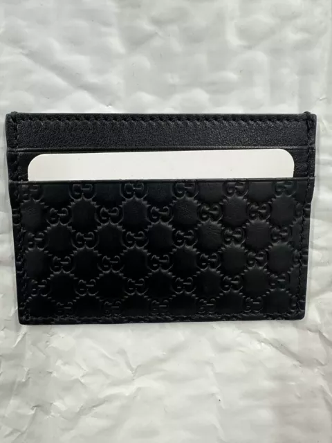 Authentic Gucci Black Microguccissima Embossed Leather Credit Card Holder
