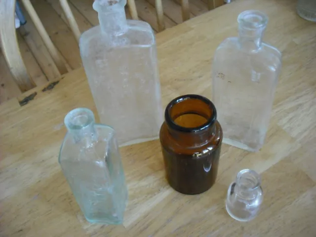 Old glass bottles vintage/antique 1900's 4x clear 1x brown, collectibles
