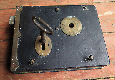 A Large Victorian Metal And Brass Rim Lock With Broken Key