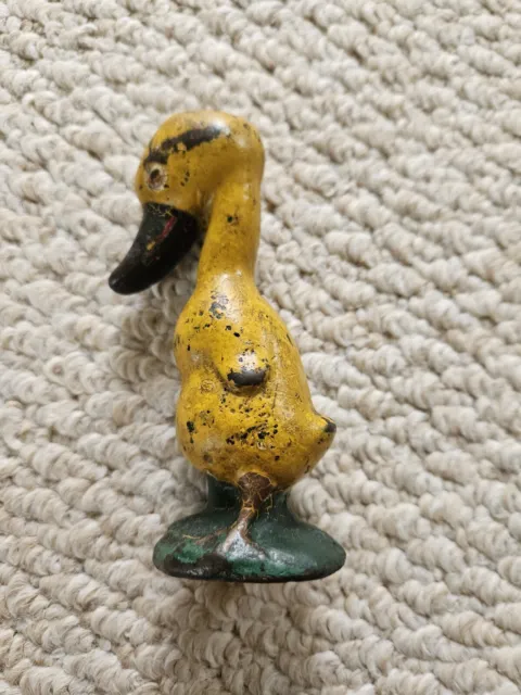 Antique Cold Painted Cast Iron Yellow Duck Green Grass Red Eyes One Piece