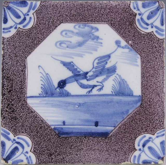 Nice Dutch Delft manganese and blue tile, swan, 18th century.