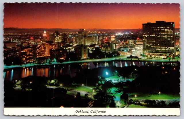 Oakland California Postcard Beautiful Night View Lake Merritt Aerial Buildings