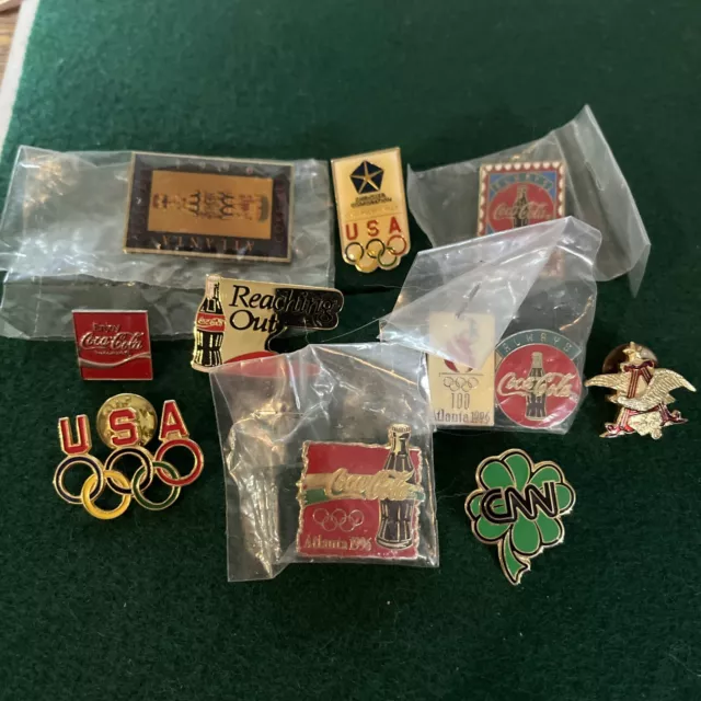 Set of 10 pins Olympic Coca-Cola Anheuser CNN